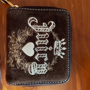 New without tags. Juicy Couture brown velvet type wallet.
